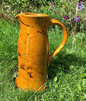 tall jug with honey glaze and cow parsley decoration